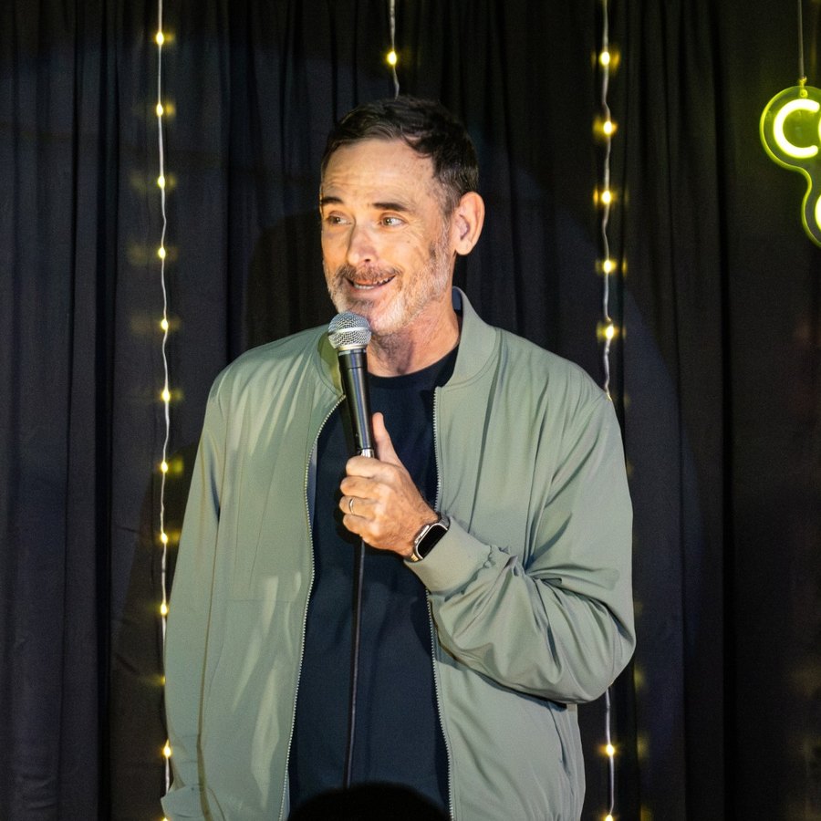 Andy Hendrickson smiling at the crowd